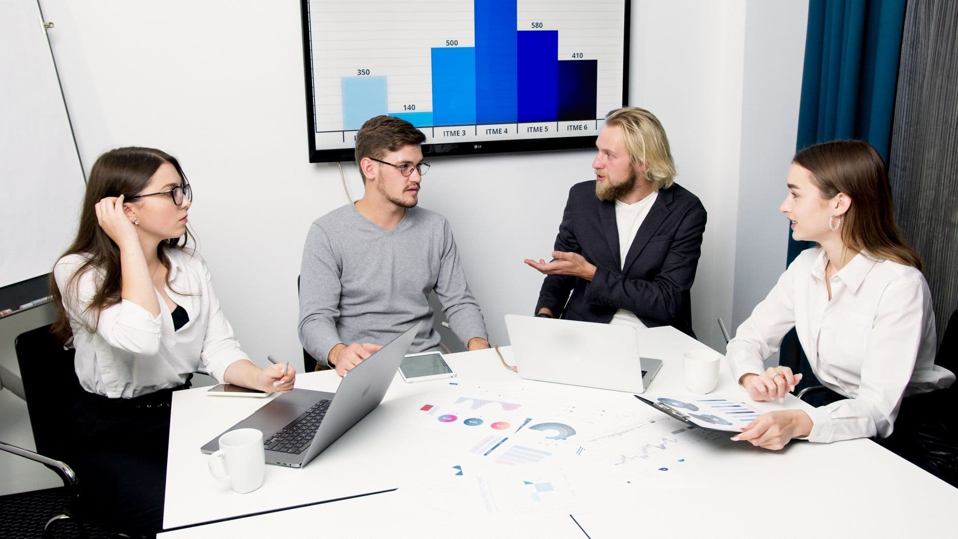 PeopleMate team collaborating in a meeting
